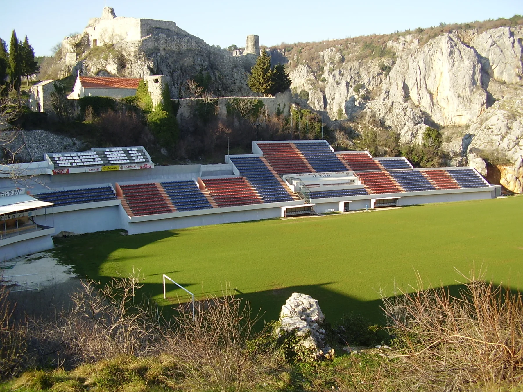 Stadion Gospin Dolac beneath the Topana Fortress in Imotski