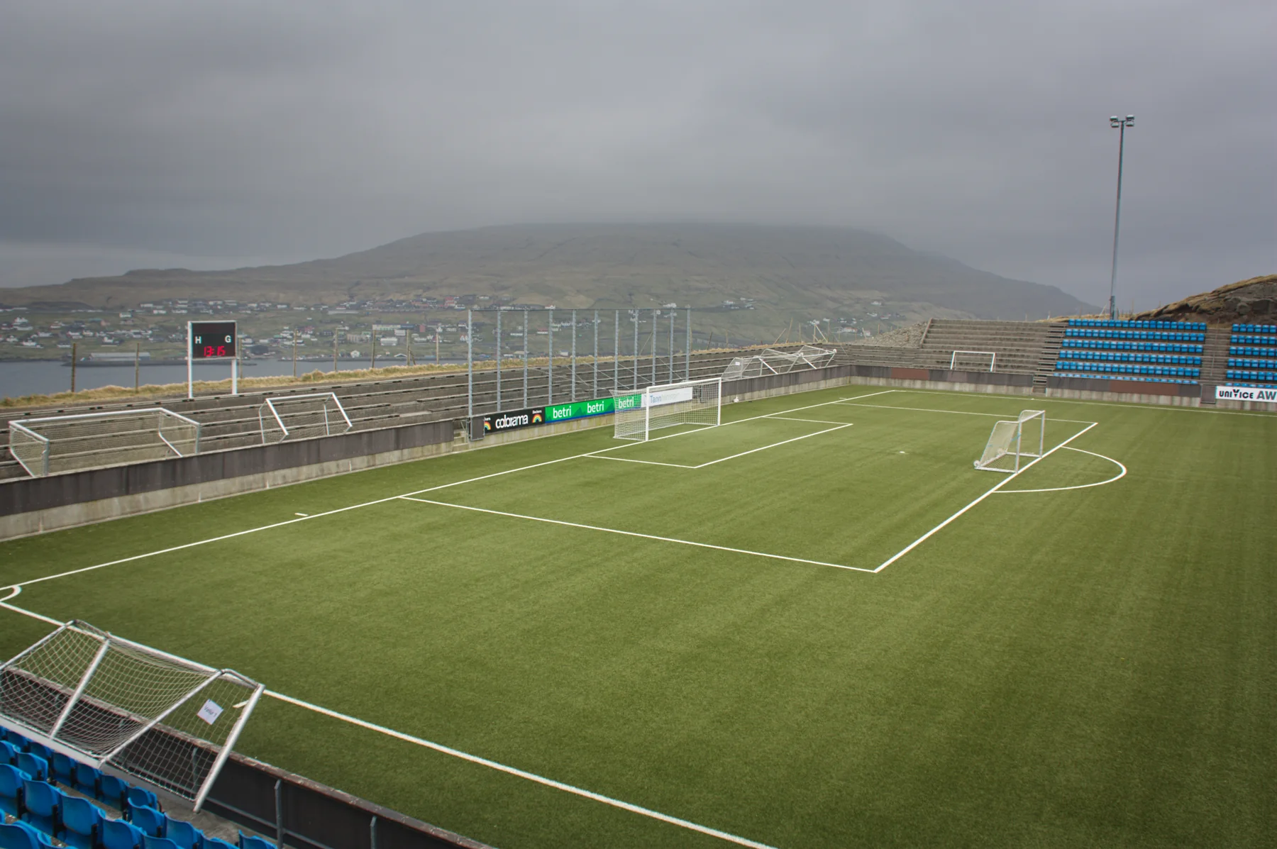 Svangaskarð football stadium overlooking the water and mountains in Toftir