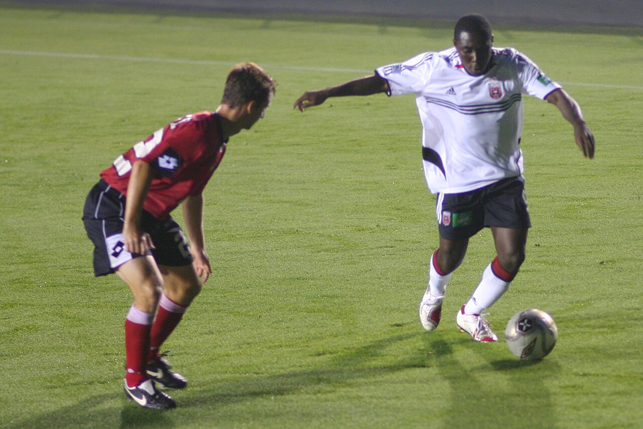 Freddy Adu dribbling for D.C. United, football's most famous teenage wonderkid